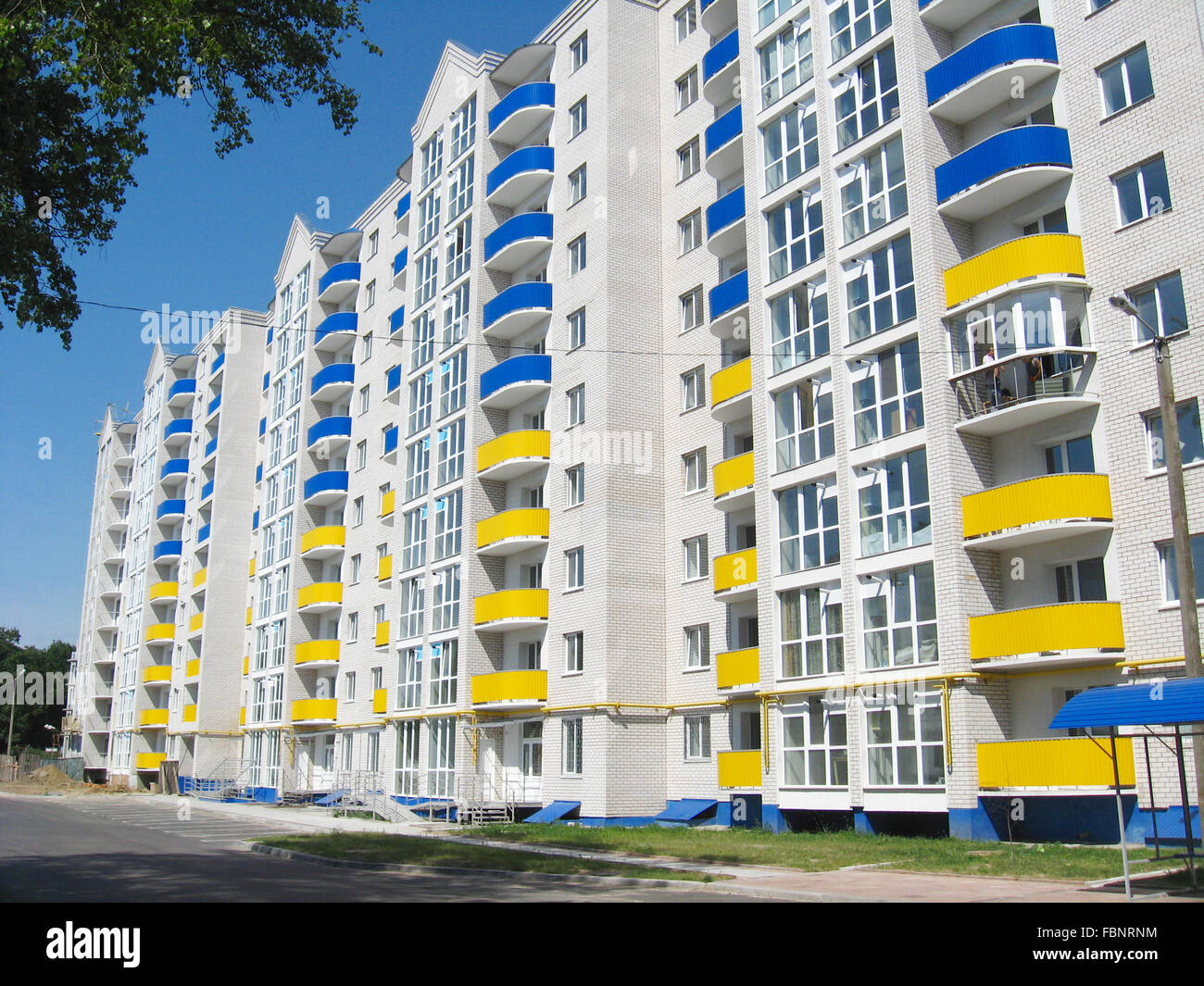 modern skyscraper on the blue sky background Stock Photo - Alamy