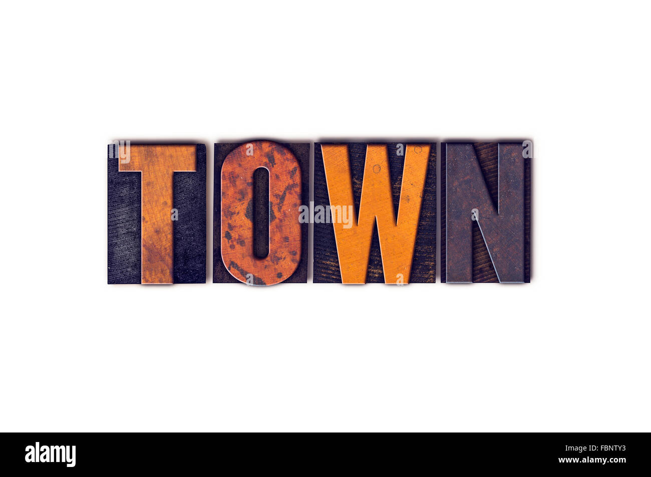 The word "Town" written in isolated vintage wooden letterpress type on