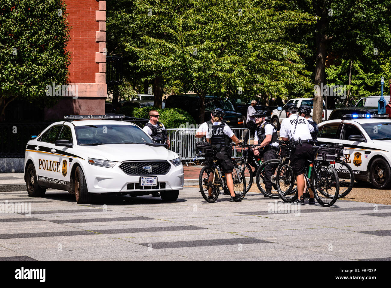 Group of United States Secret Service Police Cyclists and Ford Taurus Police Car, Washington, DC Stock Photo