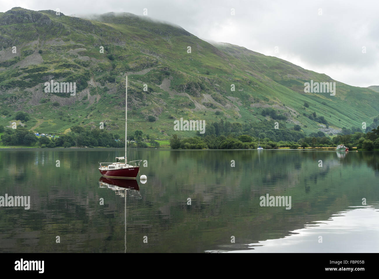 Red Yacht Moored at Ullswater Stock Photo - Alamy