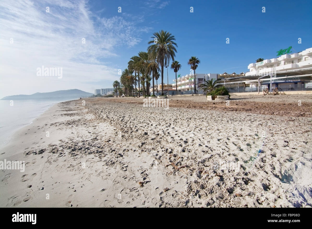 Dreamy soft winter beach on Playa d'en Bossa on a sunny winter morning. Stock Photo