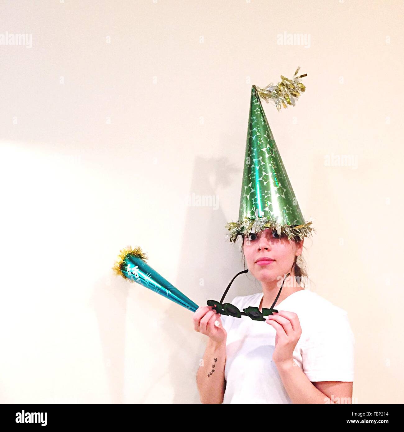 Woman wearing party hat hi-res stock photography and images - Alamy