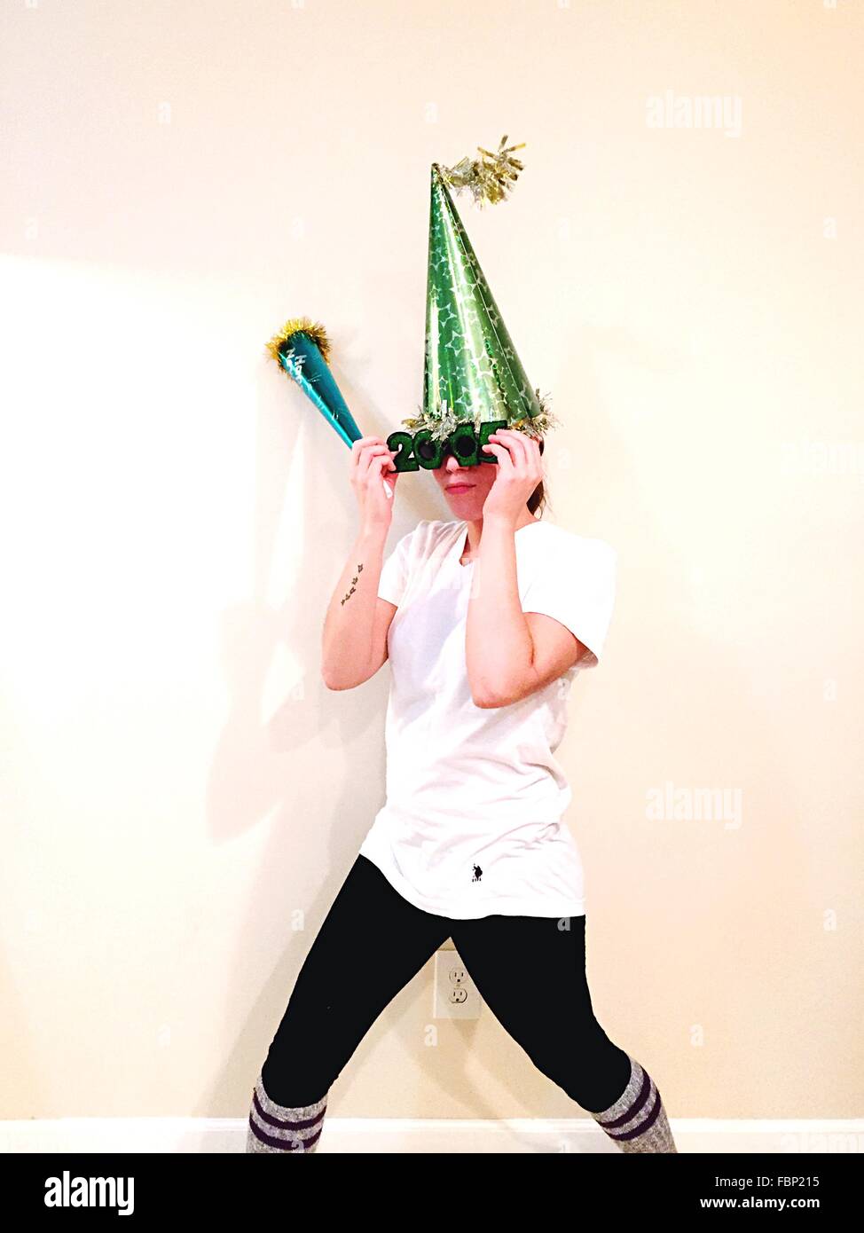 Woman wearing party hat hi-res stock photography and images - Alamy