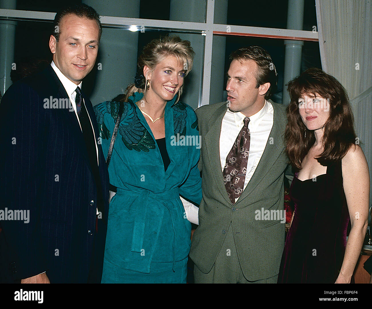 Washington, DC., USA, 19th October,  1990 Cal Ripken,Kelly Ripken, Kevin Costner, Mary McDonnell at the Kennedy Center reception after the premier opening of the movie 'Dances with Wolves' Credit: Mark Reinstein Stock Photo