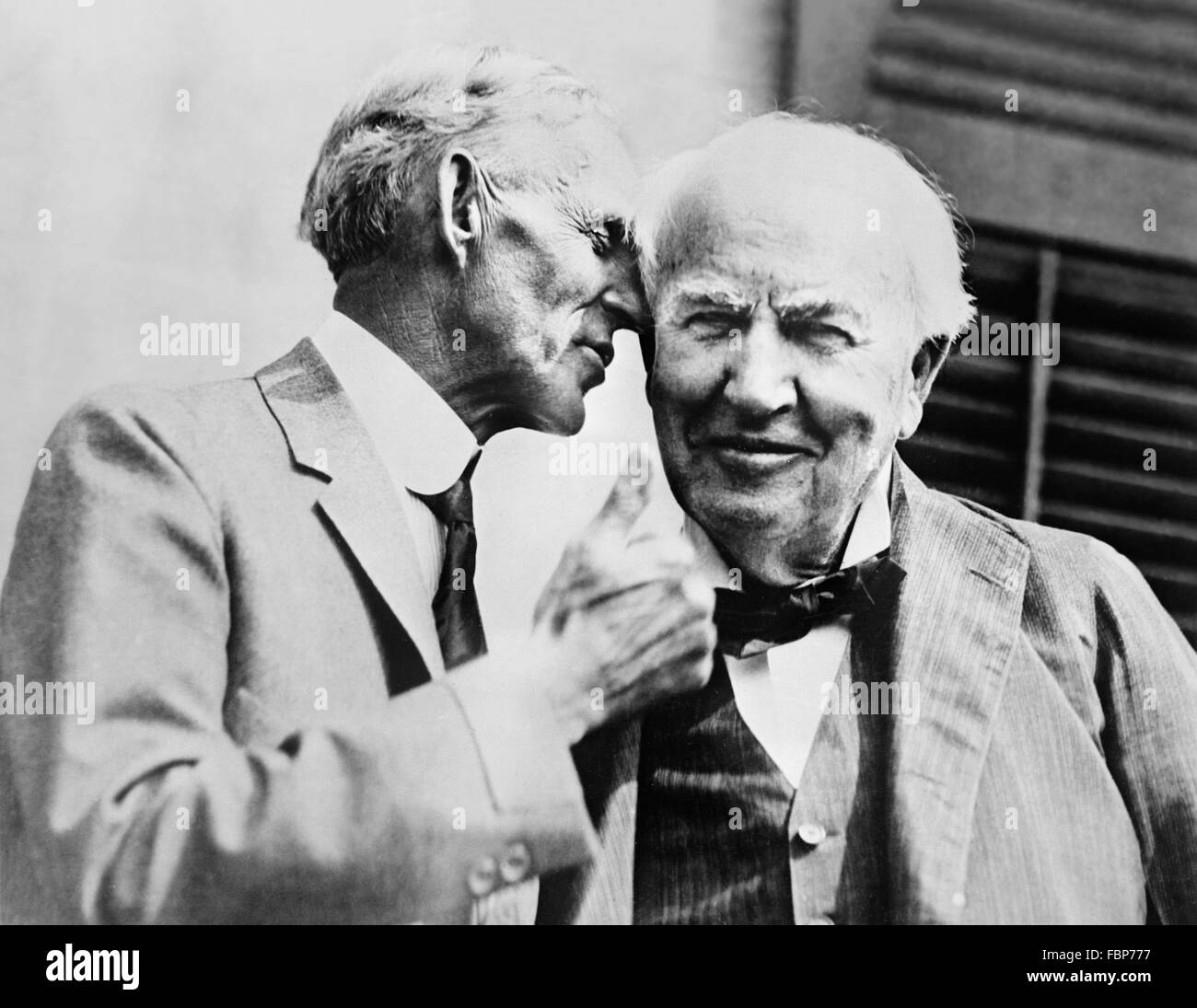 Automobile pioneer Henry Ford talking to inventor Thomas Alva Edison, c.1930 Stock Photo