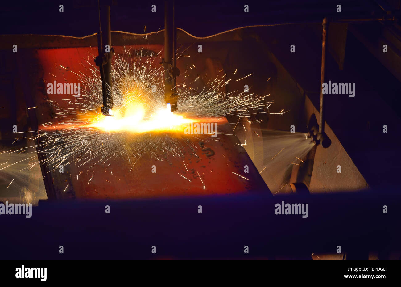 Gas cutting of the hot metal plate Stock Photo Alamy