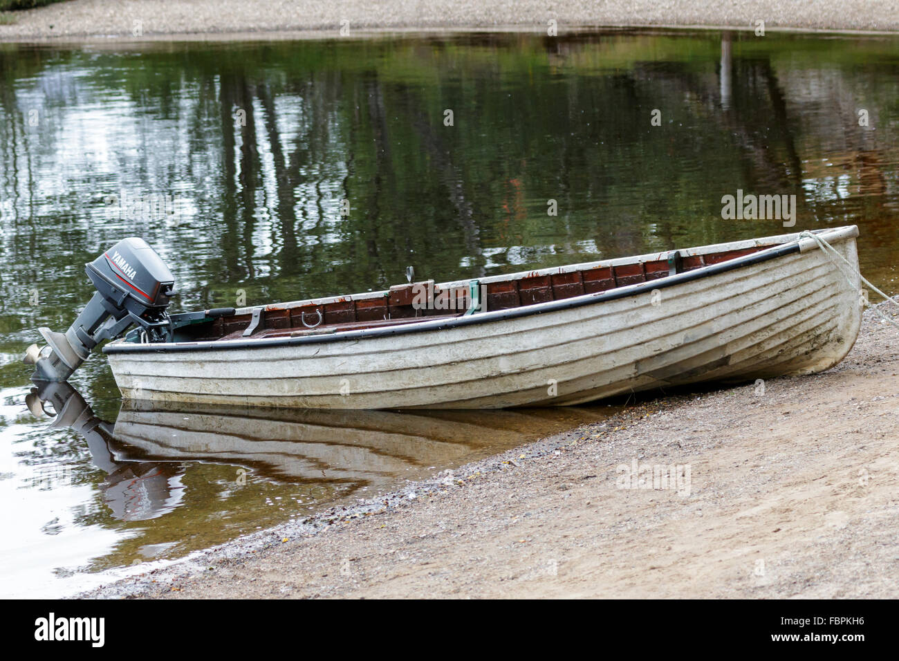 Rowing Boat Moored on Loch Insh Stock Photo - Alamy
