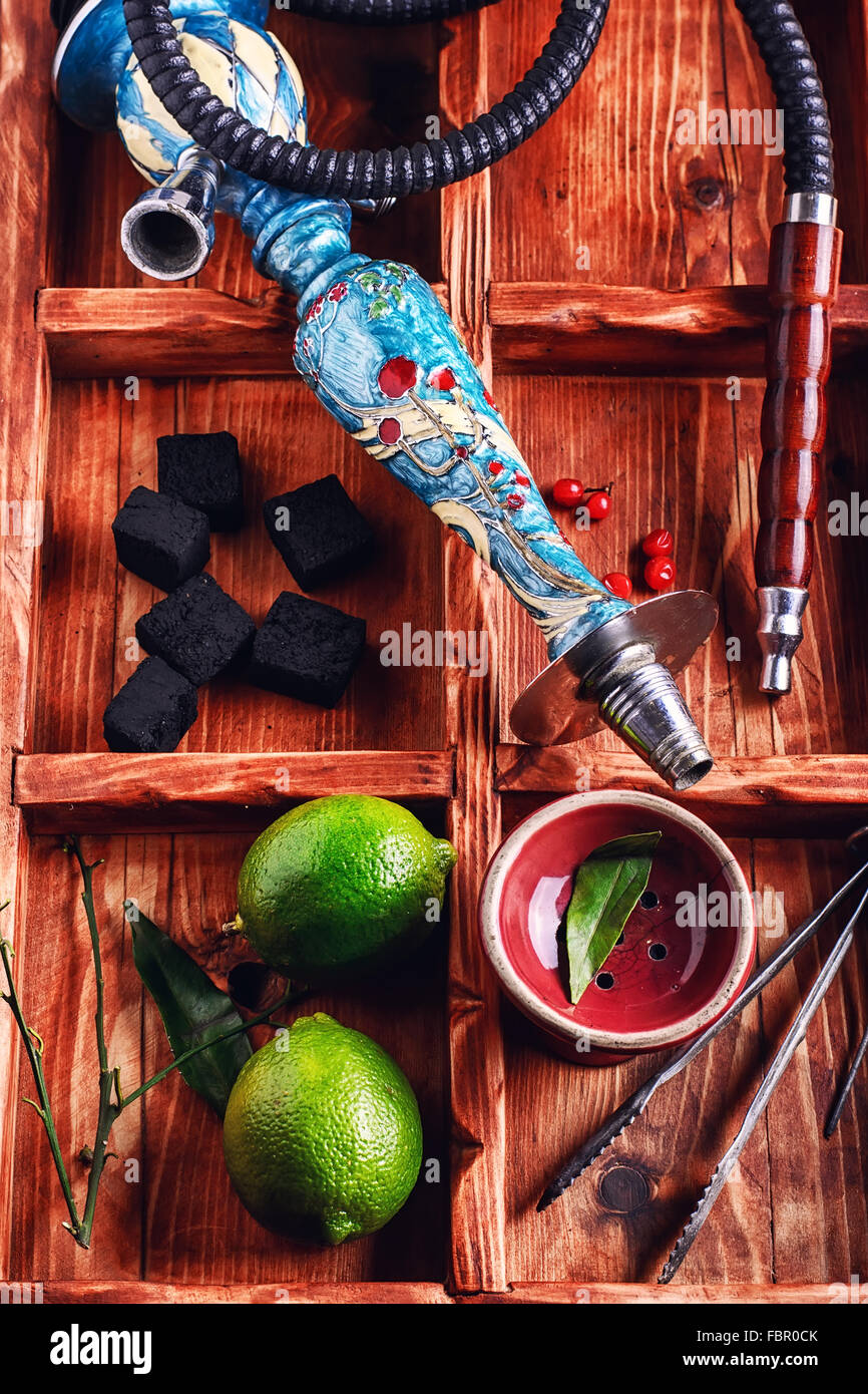 dismantled parts of the hookah in stylish wooden box with fruits lime Stock  Photo - Alamy
