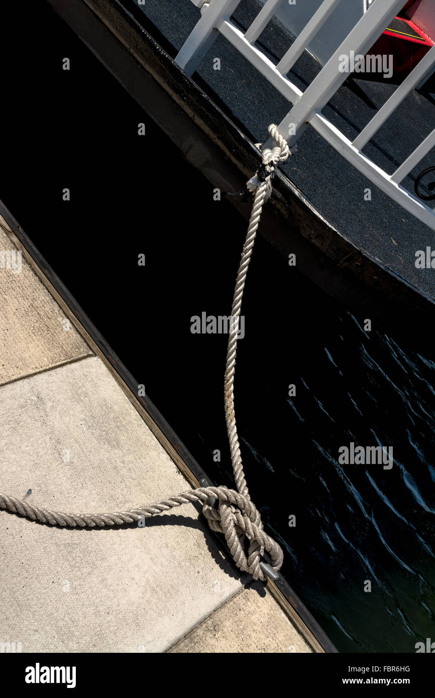 Rope used to tie a boat ot the Doc Stock Photo