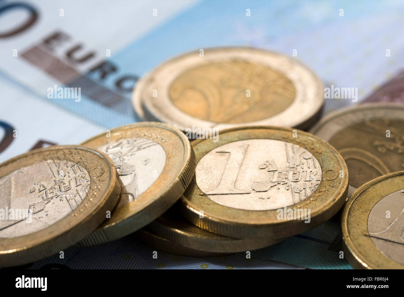 Euro coins and bills Stock Photo - Alamy