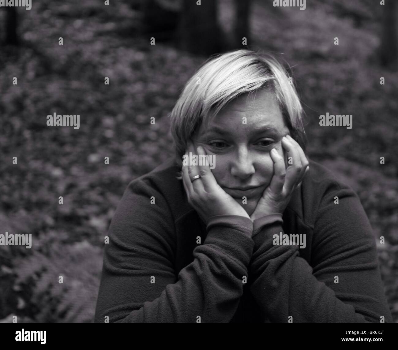 Woman head in hands hi-res stock photography and images - Alamy
