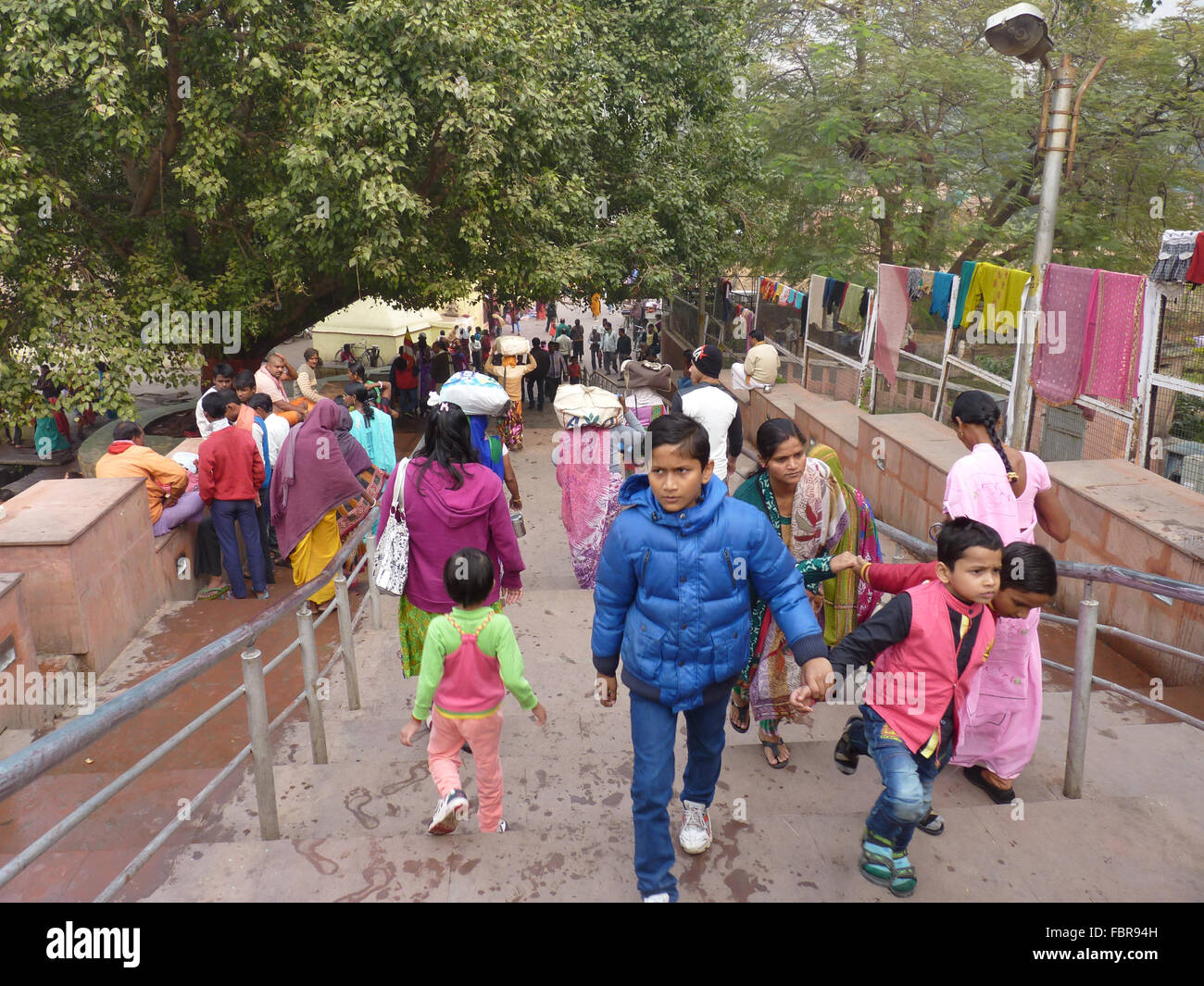 People Coming out of a Temple Complex Stock Photo