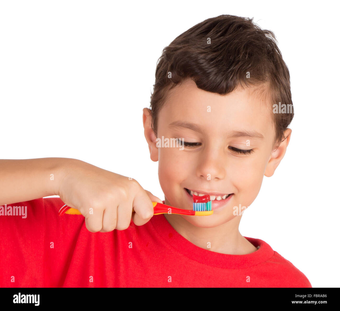 Young kid ready to brush his teeth Stock Photo