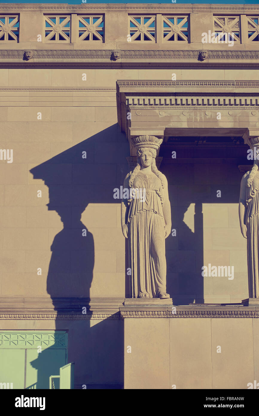 Caryatid on front of classic building Stock Photo