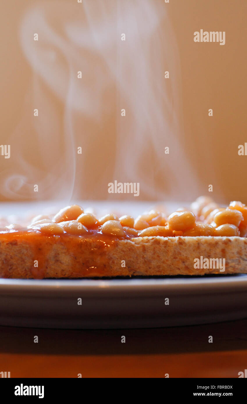 Baked beans on toast with steam rising Stock Photo Alamy