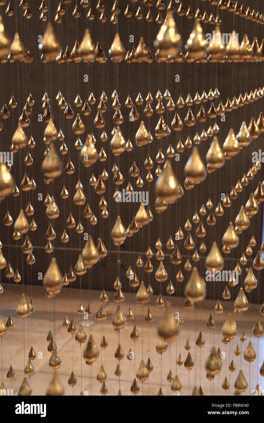 Bangkok, Thailand, 2016. Hundreds of golden teardrops all perfect order. Stock Photo