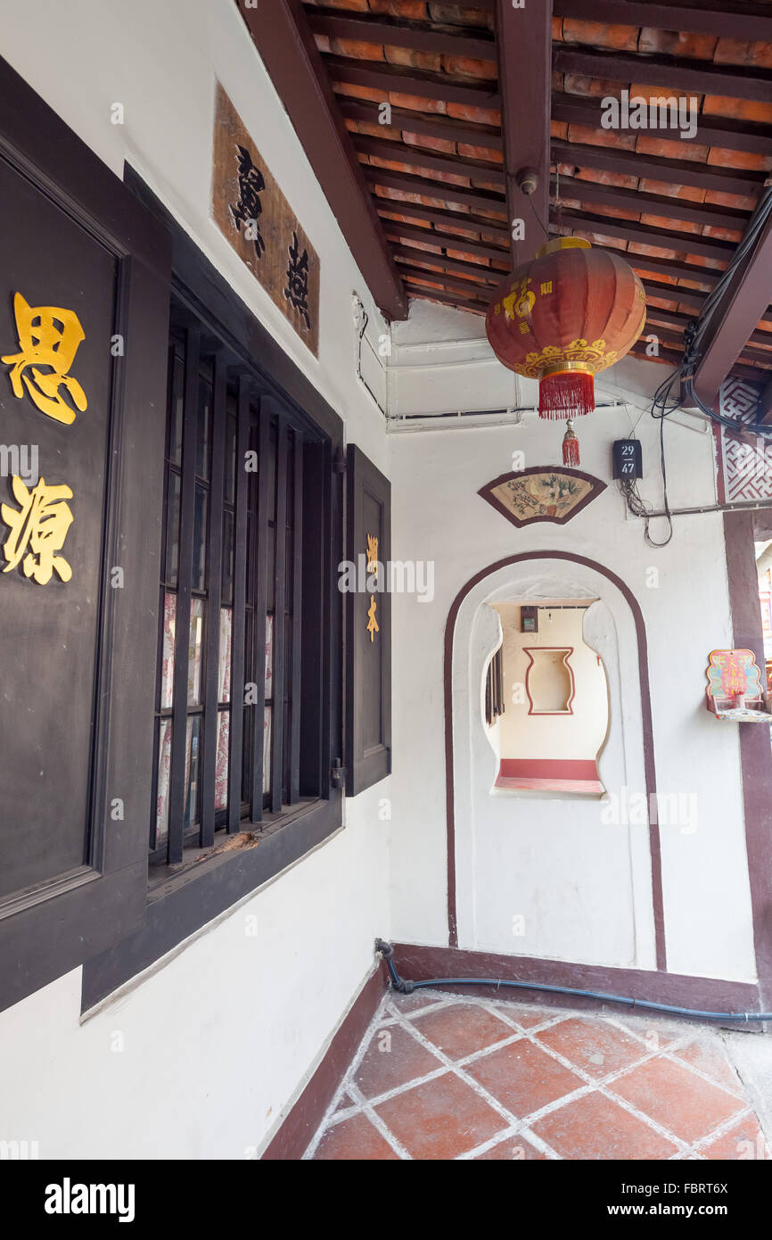 Lantern hanging under the eaves of the house Stock Photo Alamy