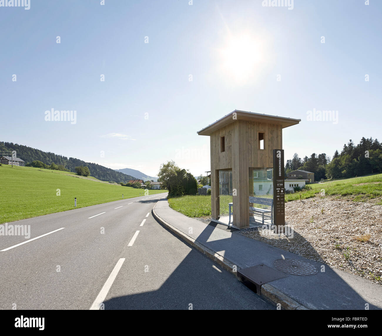 Tower-like bus stop on country road. Bus Stop Oberkrumbach by Alexander Brodsky, Oberkrumbach, Austria. Architect: Alexander Bro Stock Photo