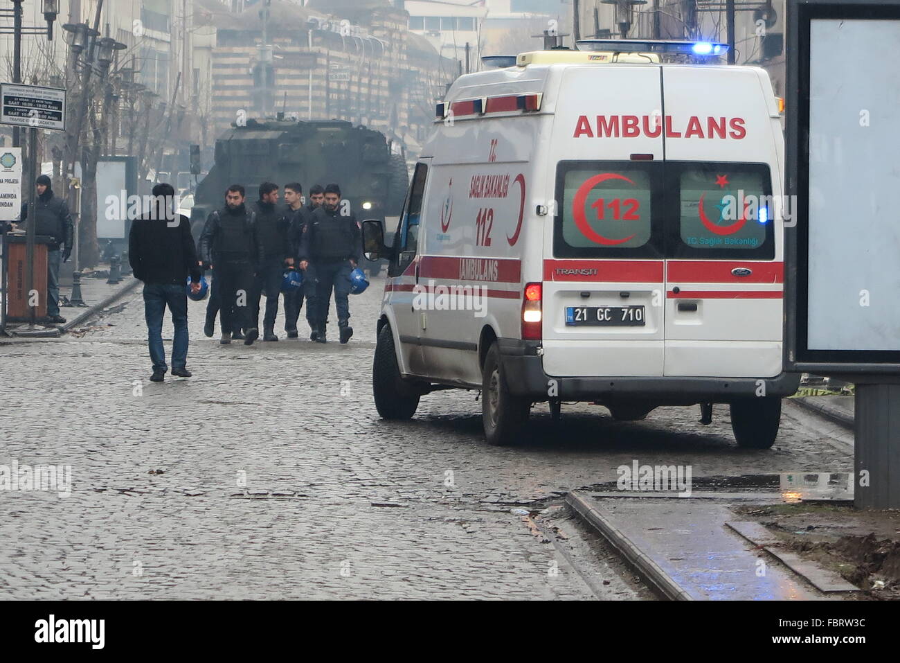 Diyarbakir, Turkey. 18th Jan, 2016. An ambulance and an army vehicle ...