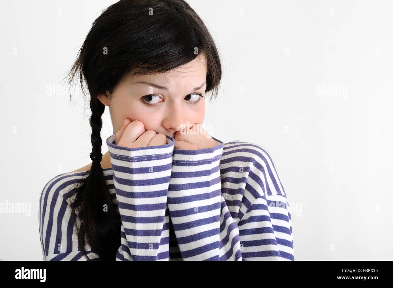 portrait of worried young woman Stock Photo