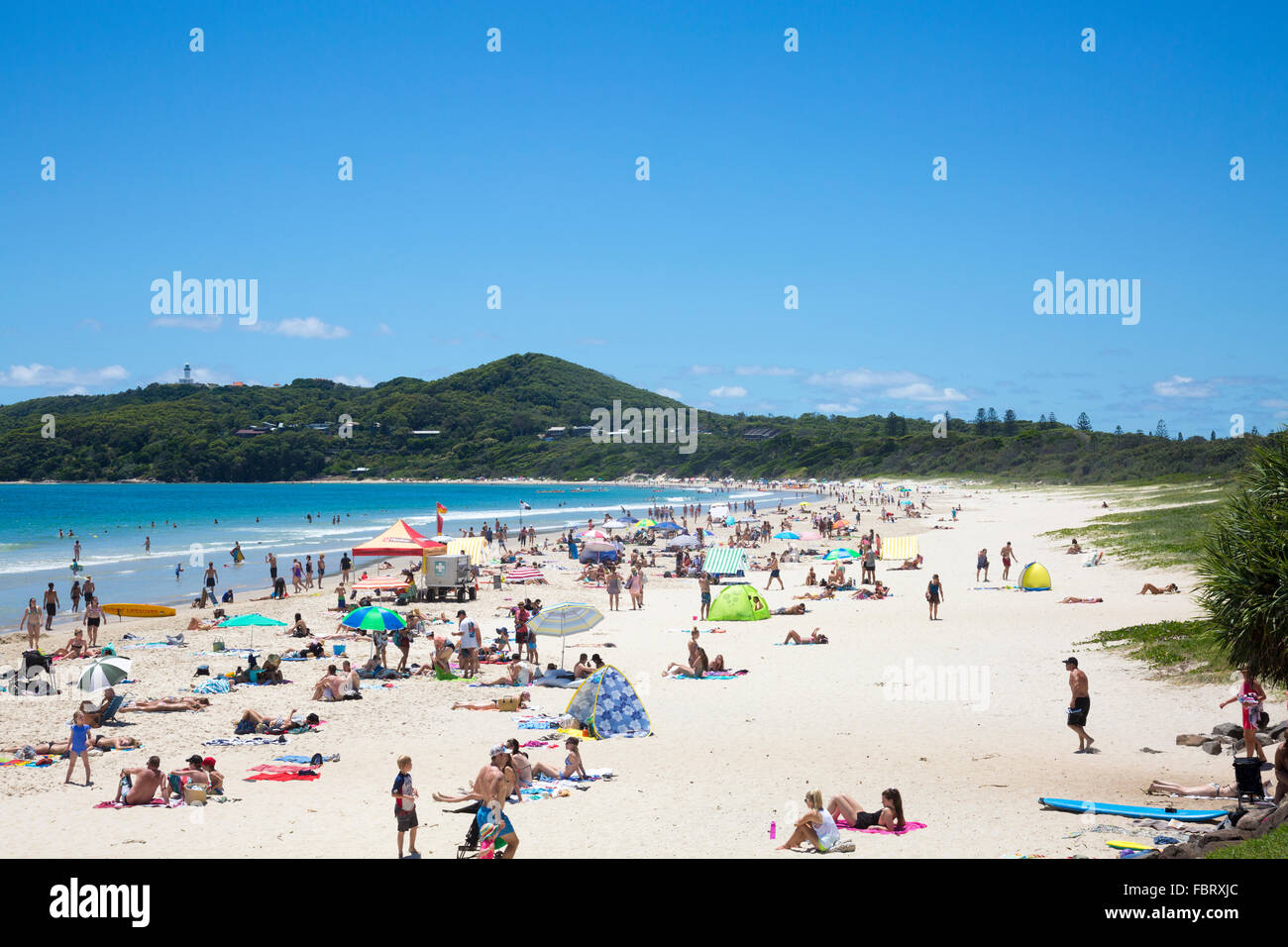 Byron bay and a busy Main Beach during summer, northern New South Wales,Australia Stock Photo