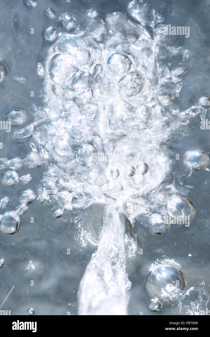 Bubbles in frozen water Stock Photo