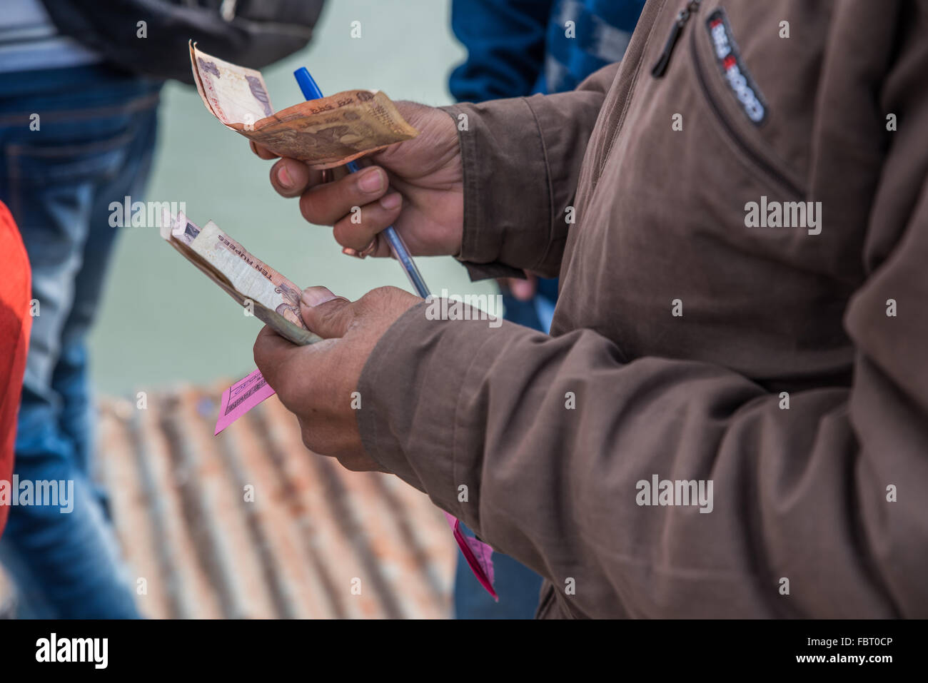 Ferry tickets. Selling tickets for the journey from the mainland to Majuli Island . Crossing the Brahmaputra River, Assam India Stock Photo