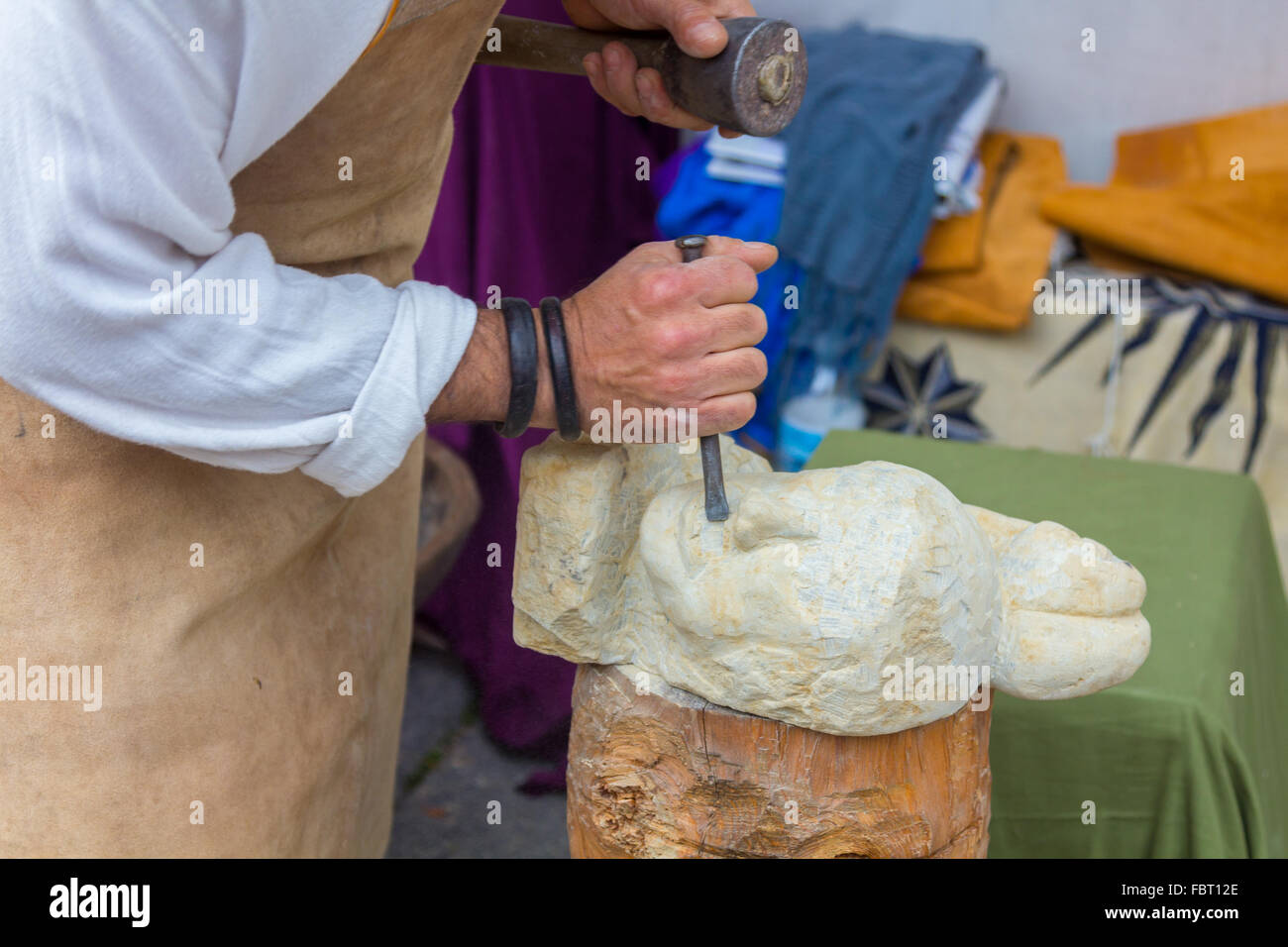 Stone sculptor working with his tools Stock Photo Alamy