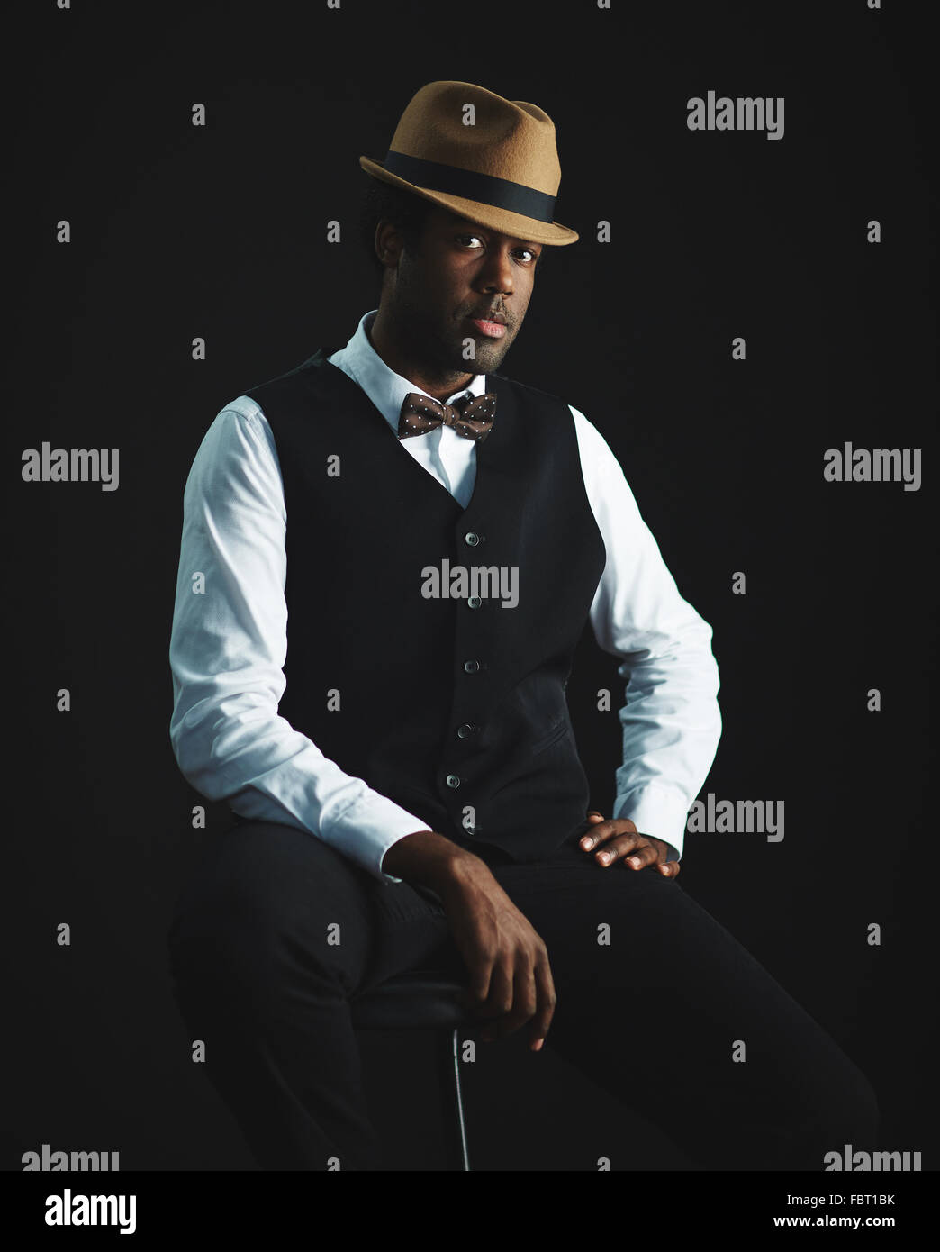 Elegant man in hat hi-res stock photography and images - Alamy