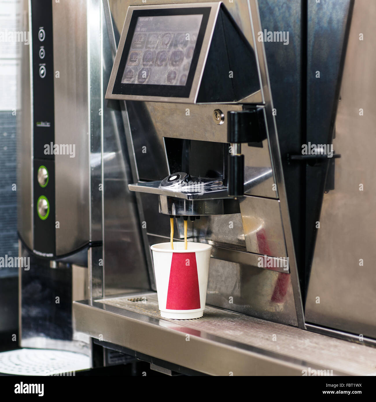 Coffee machine making a cup of coffee Stock Photo Alamy