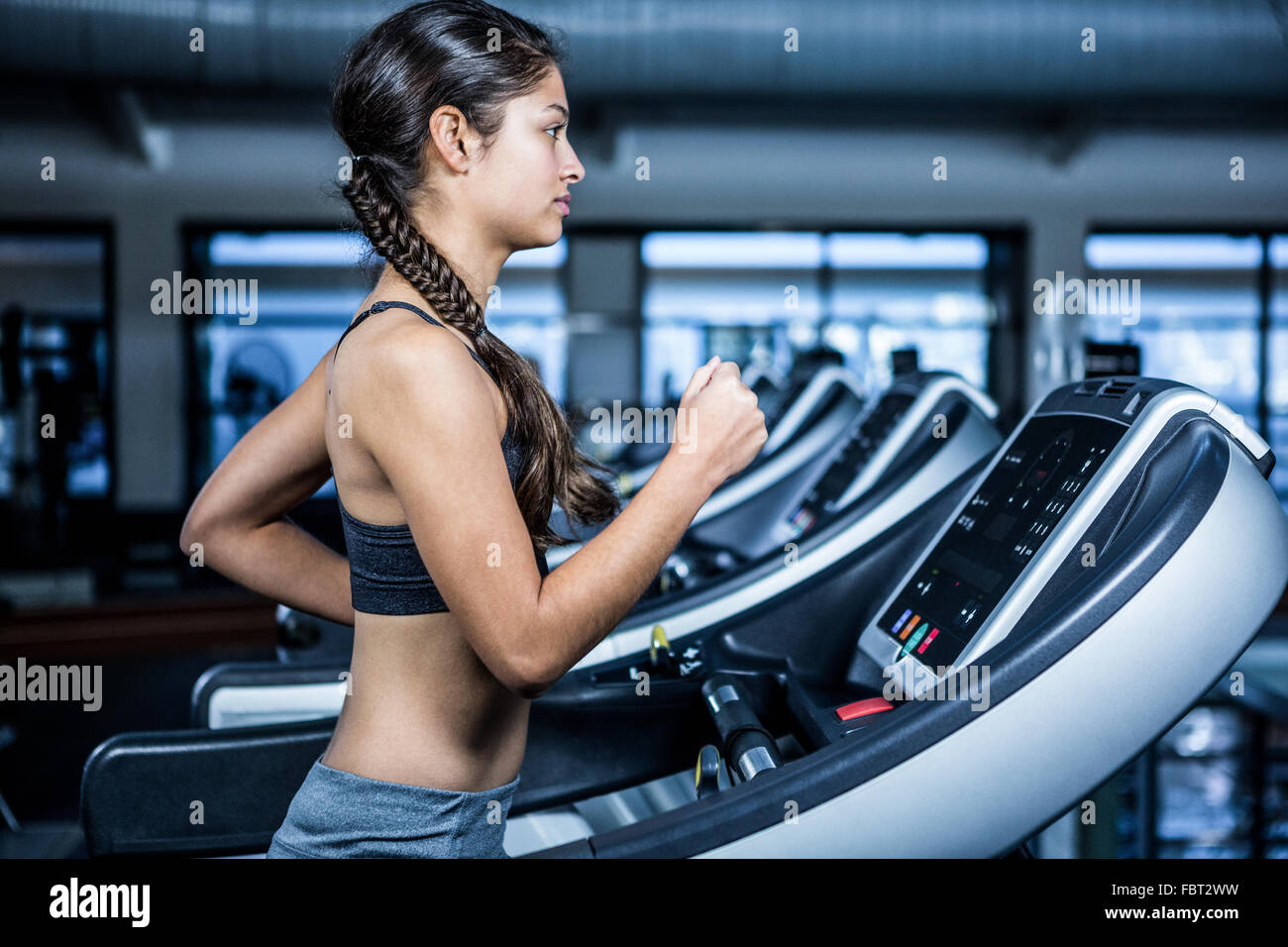 Fit woman jogging on treadmill Stock Photo Alamy