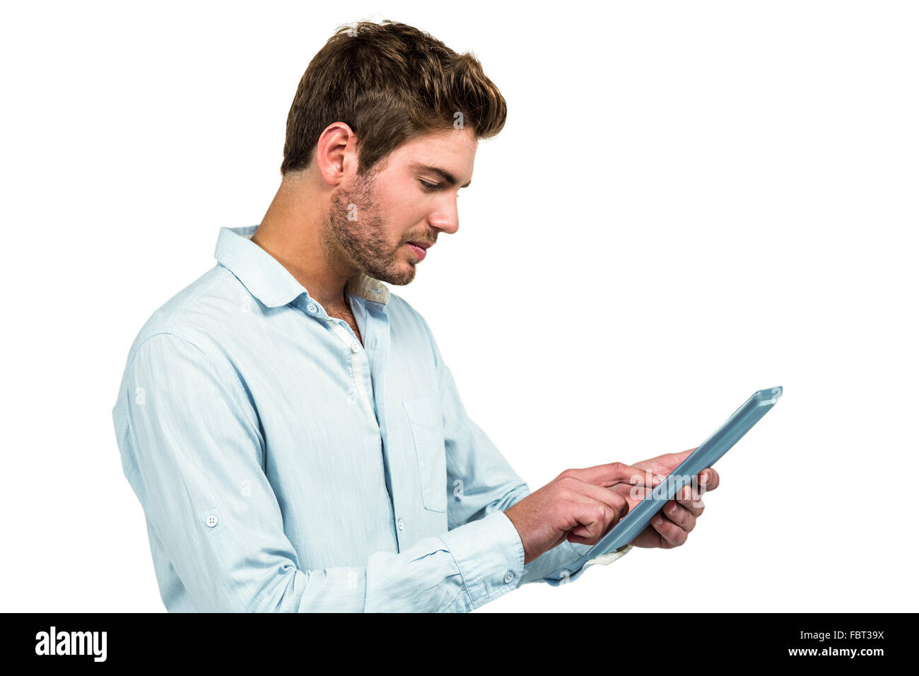 Handsome man using tablet Stock Photo