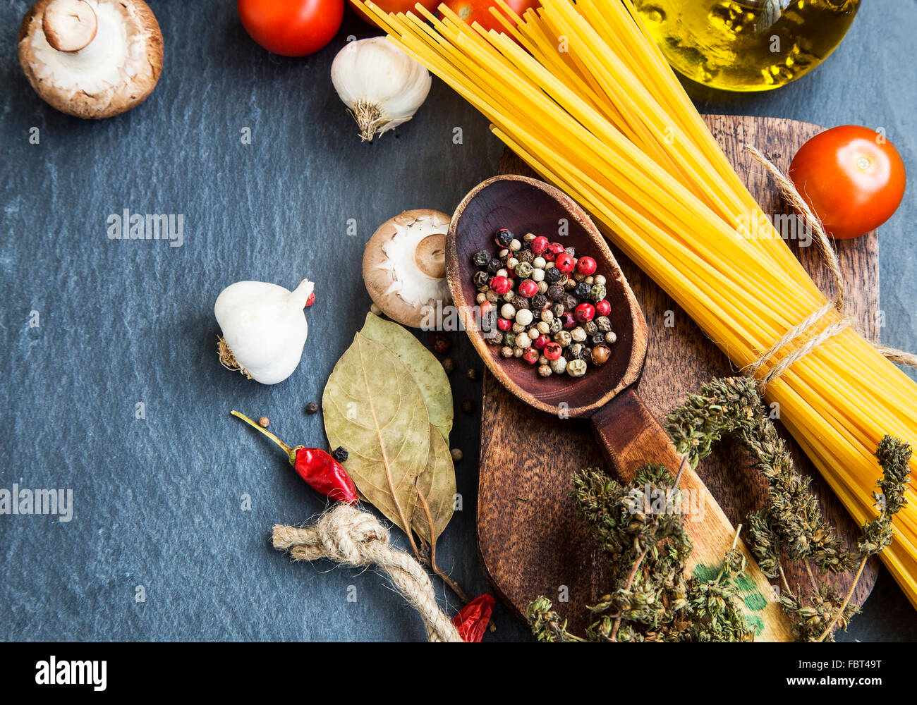 Italian meal ingredients with pasta,spices,tomatoes,olive oil,mushrooms Stock Photo Alamy