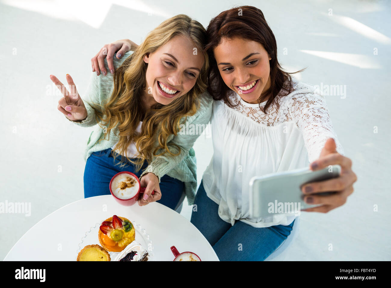 two girls take a selfie Stock Photo
