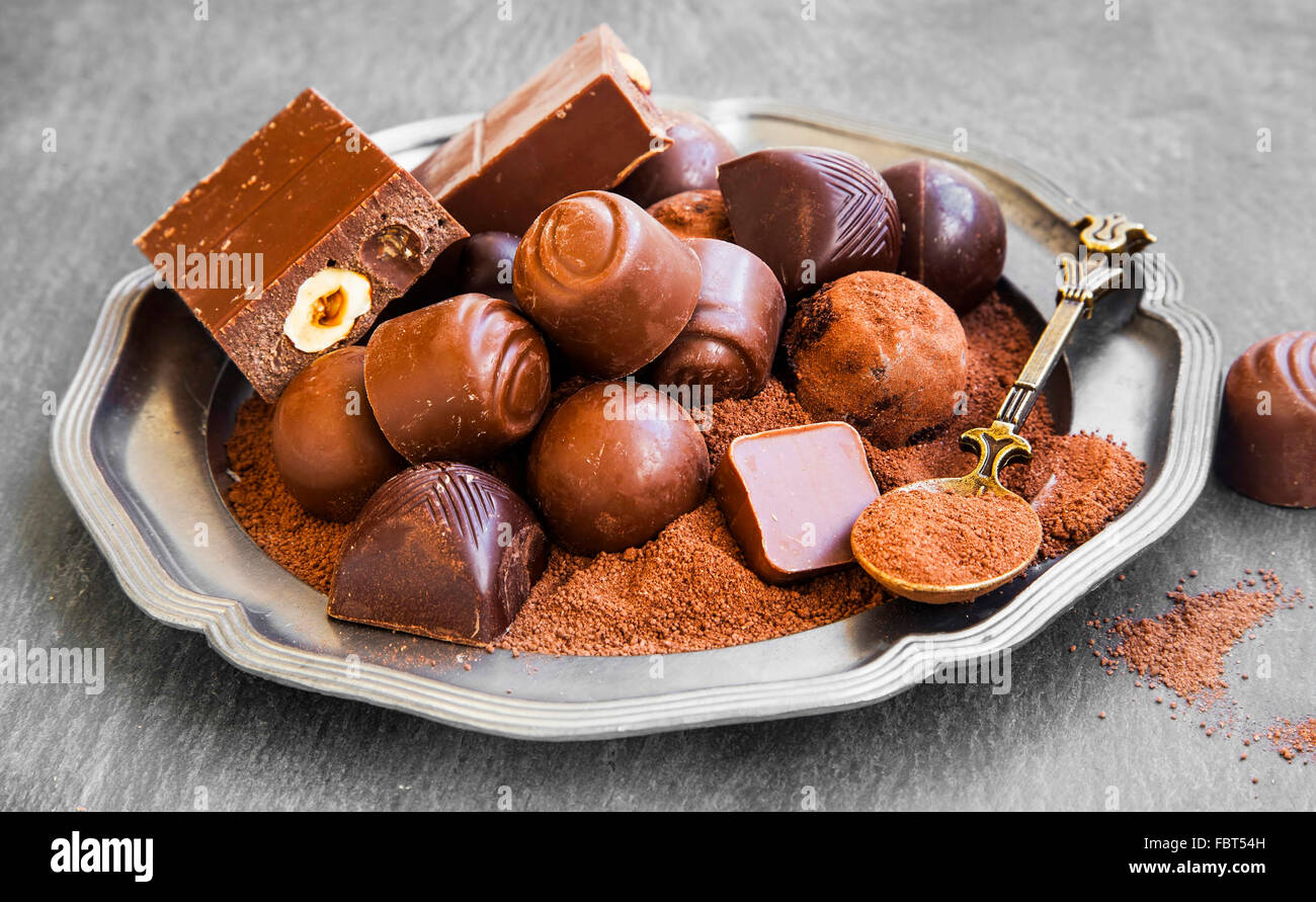 Chocolate pralines assortment with cocoa powder,sweet and tasty dessert Stock Photo