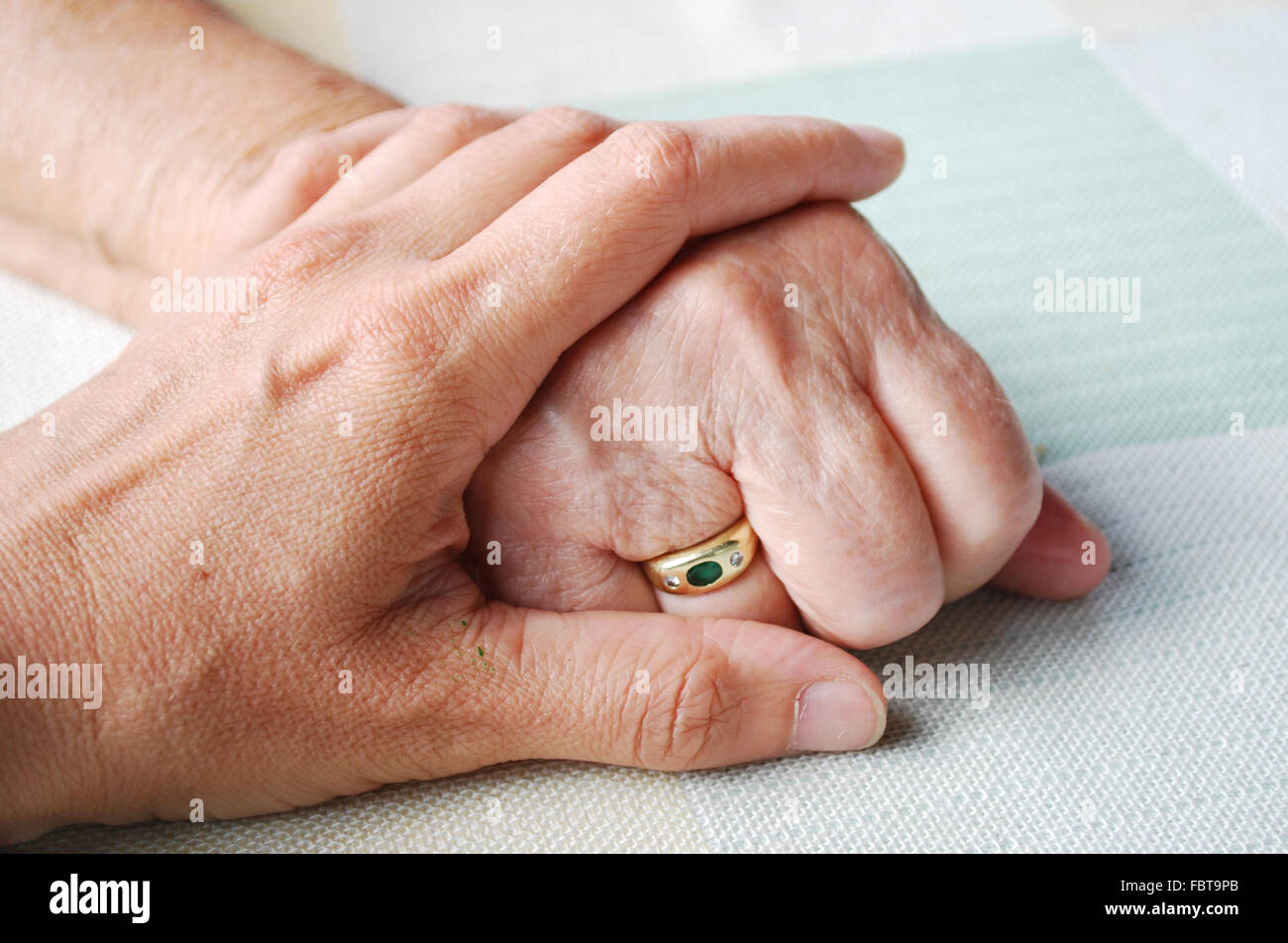 old and young hand Stock Photo