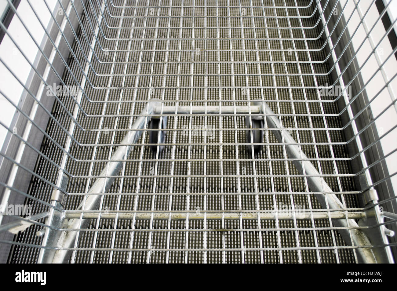shopping cart on escalator Stock Photo Alamy