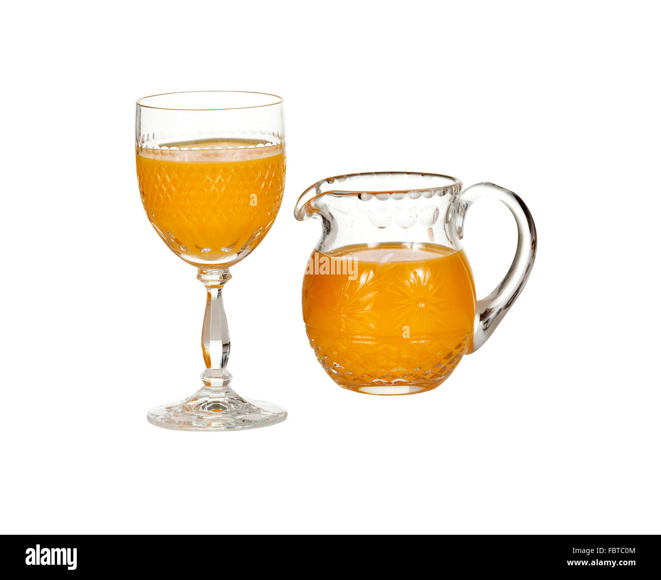 Orange juice pitcher or jug with oranges. Separate clipping paths for  pitcher, for whole composite and for shadow. Infinite dept Stock Photo -  Alamy