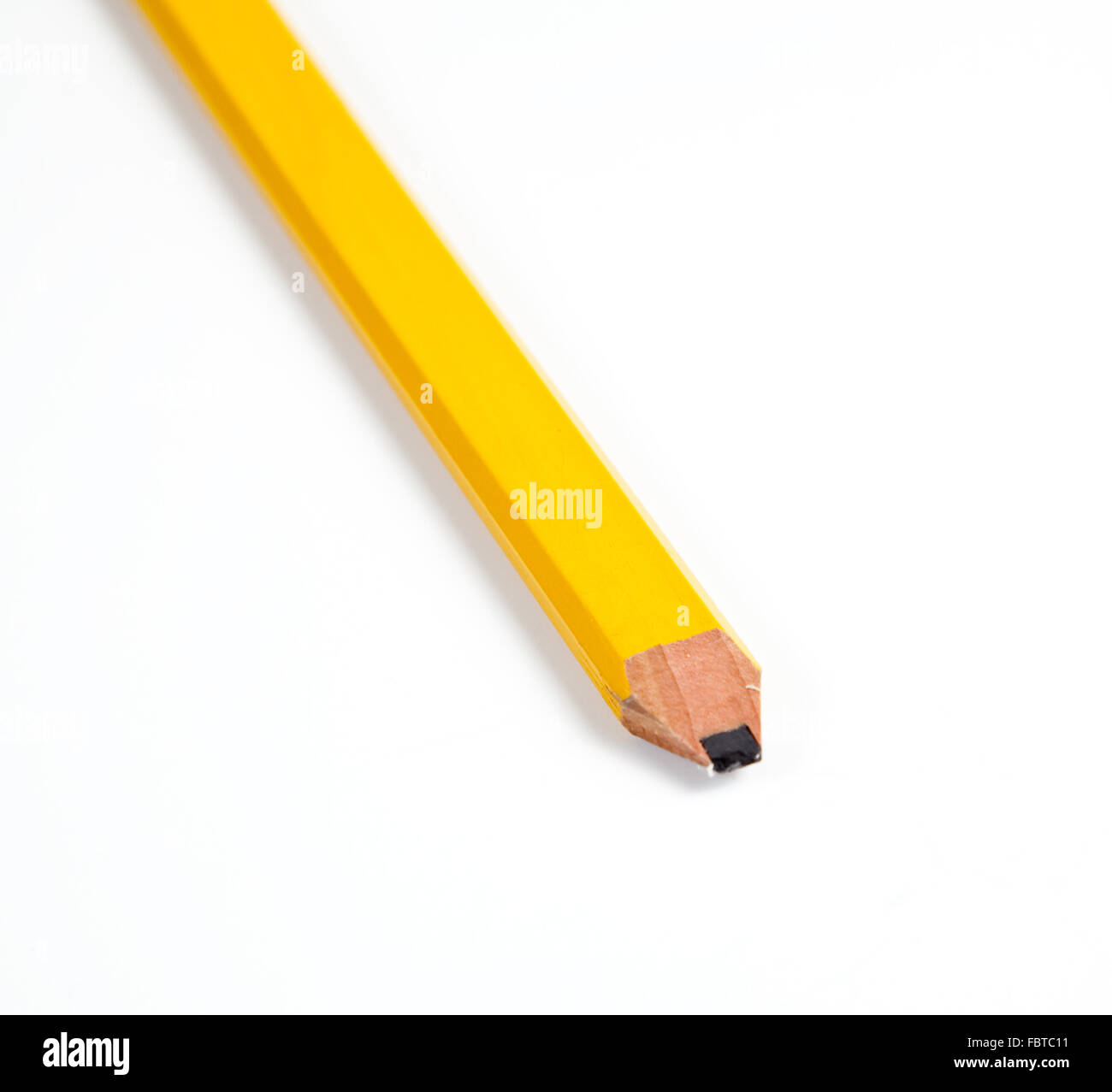 Close up of a wooden carpenter's pencil with broad sharpened point Stock Photo