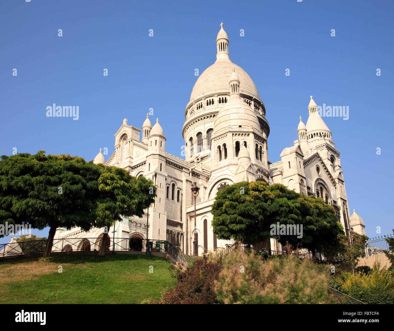 Montmartre hill leads towards the Sacre Coeur church in Paris Stock Photo