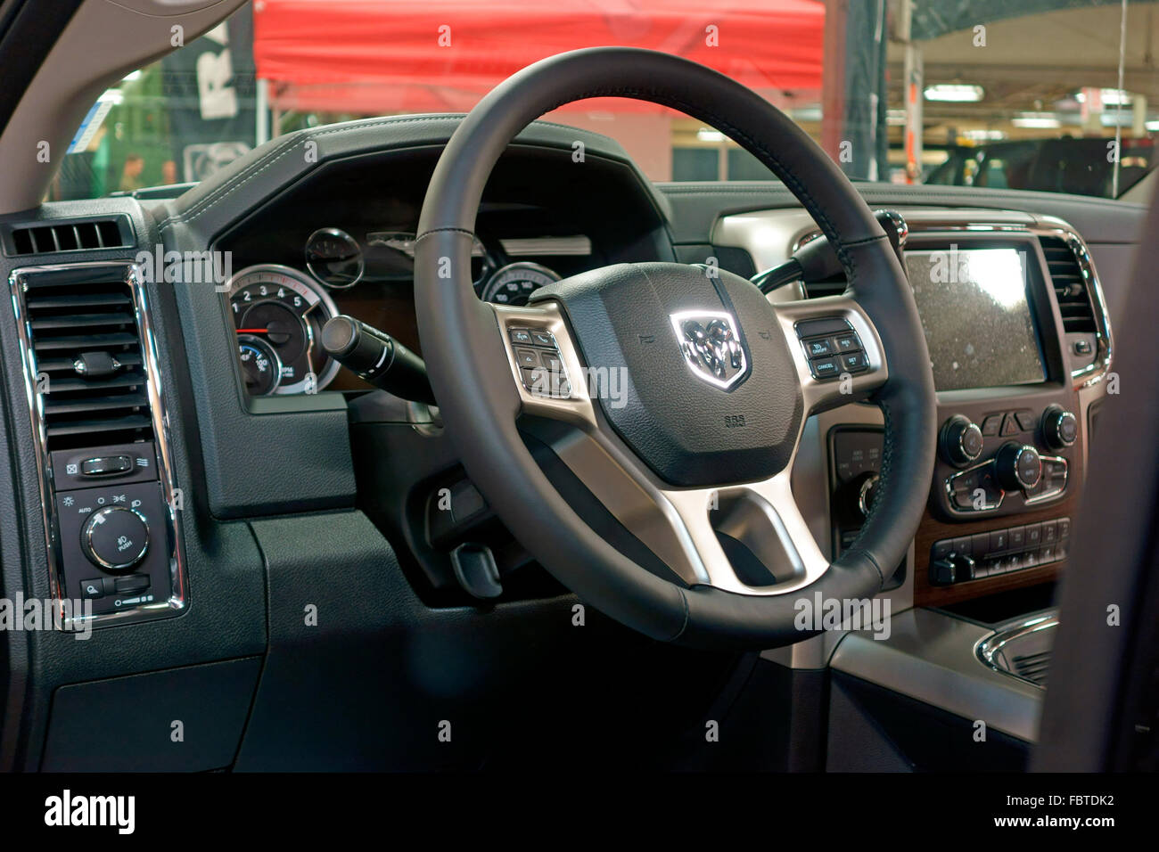 The steering wheel and dash of a 2015 or 16 Dodge Ram truck Stock Photo