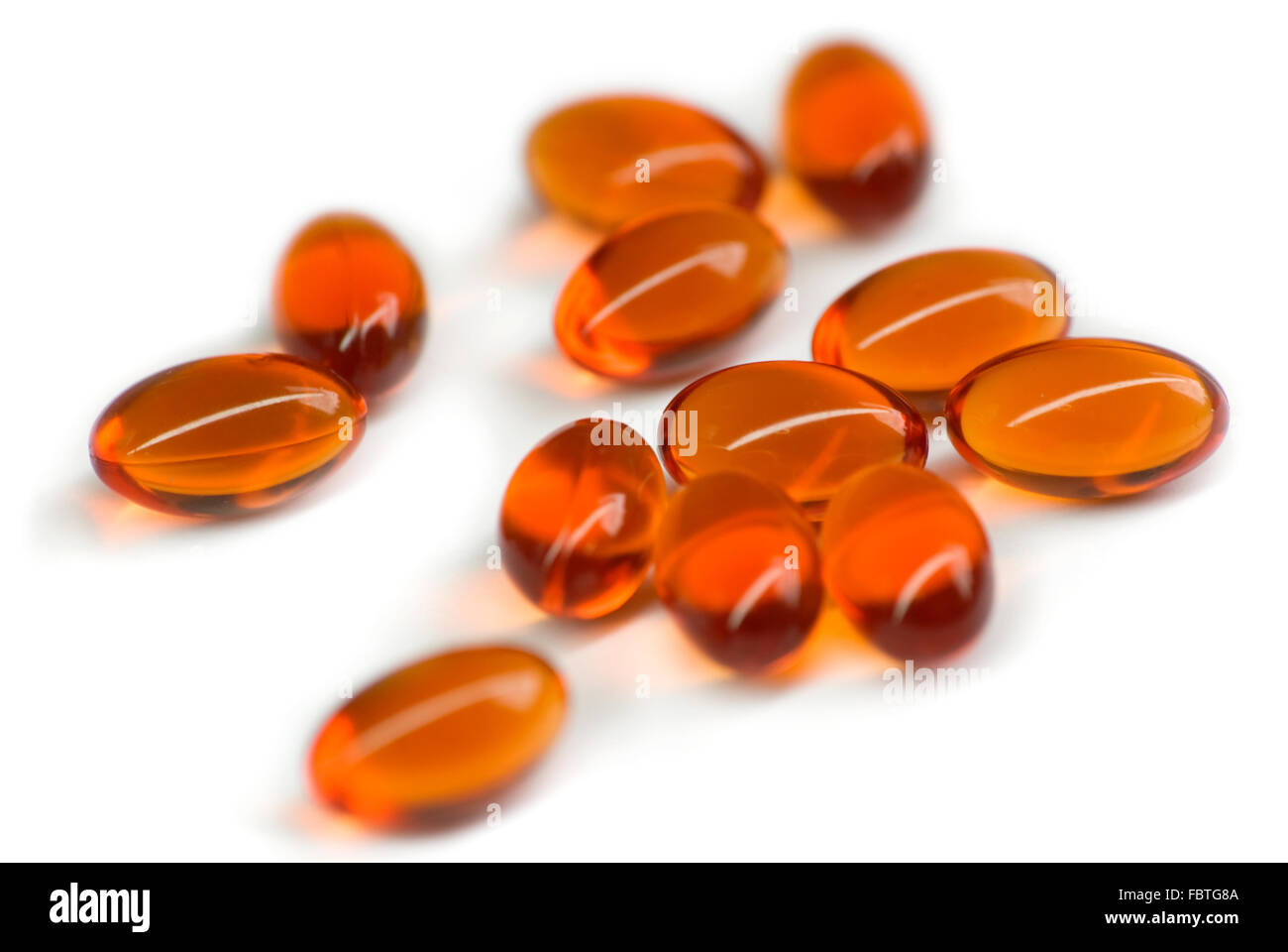 red capsules Stock Photo - Alamy