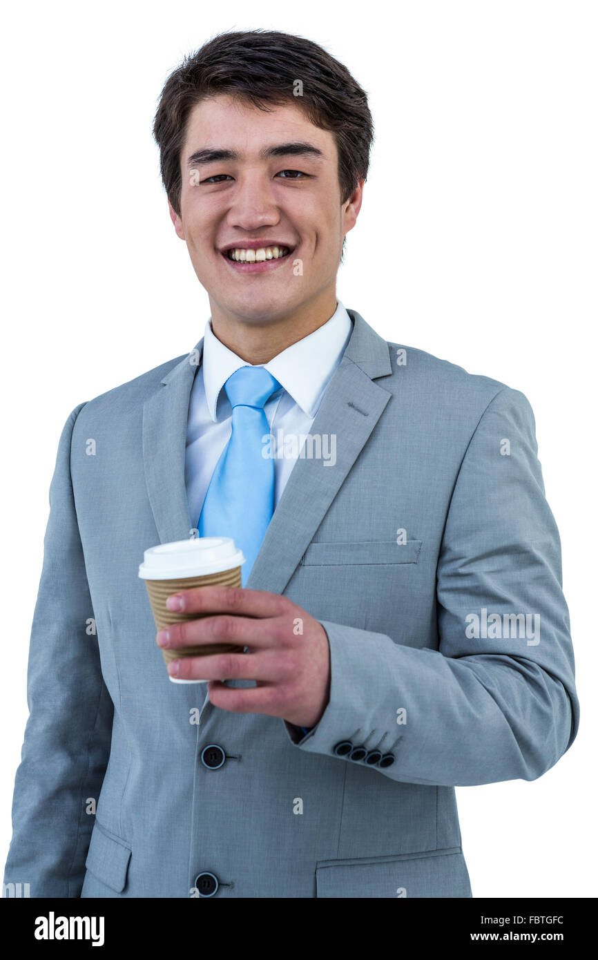 Businessman drinking coffee smiling camera hi-res stock photography and ...