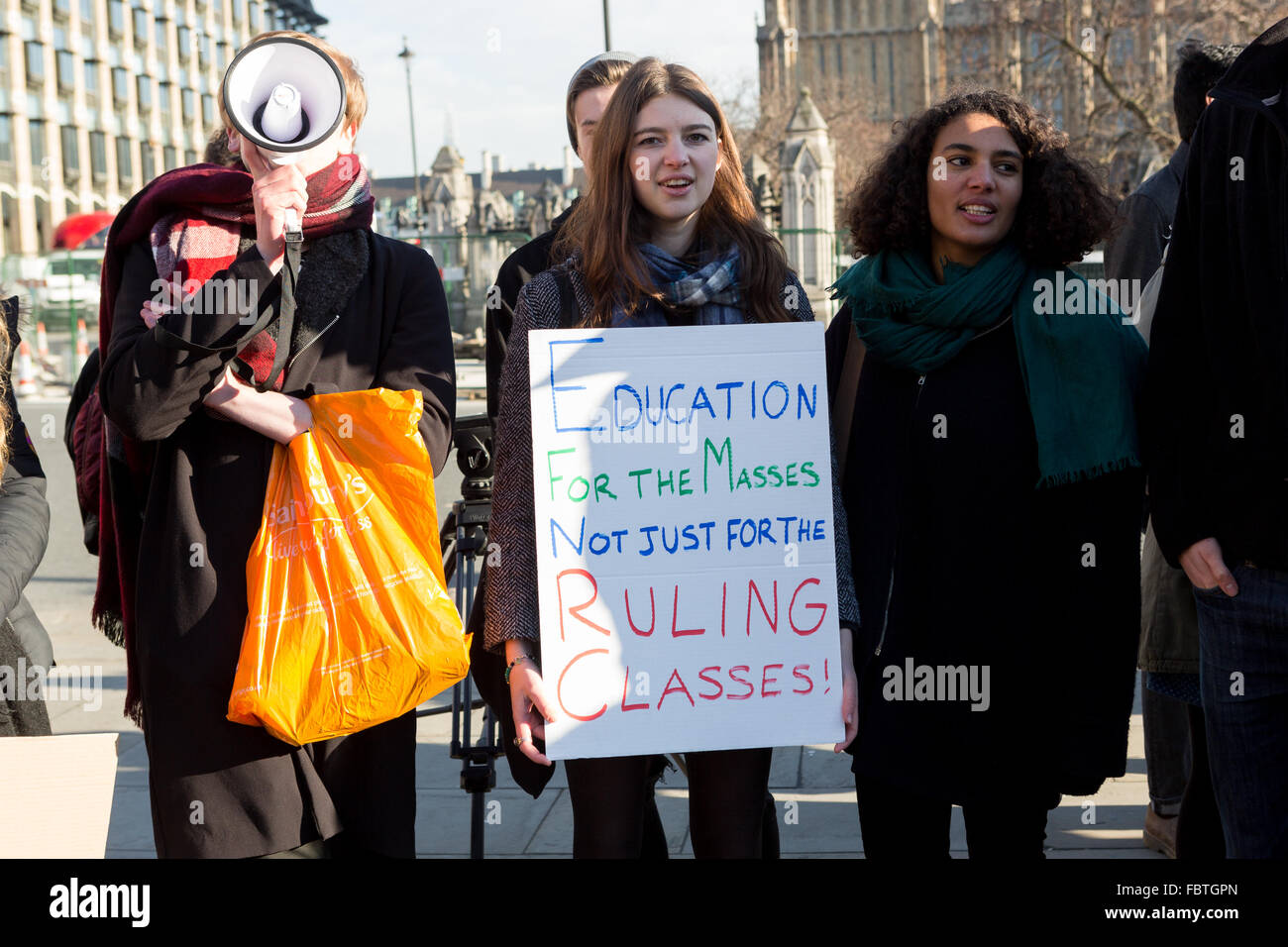 London, UK. 19th January 2016. Students and supporters stage a protest in Parliament Square, Westminster against the abolition of student maintenance grants and replacement with loans. Demonstrators are protesting against a decision taken last week by the Third Delegated Legislation Committee to scrap maintenance grants which help the poorest students pay for living costs. Credit:  London pix/Alamy Live News Stock Photo
