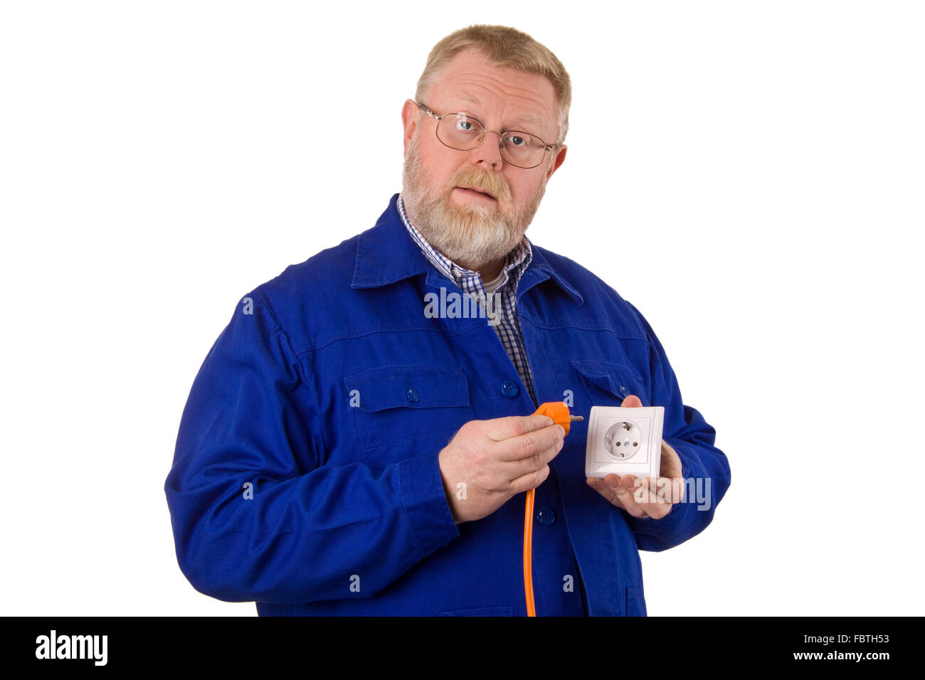Electrician with power plug Stock Photo