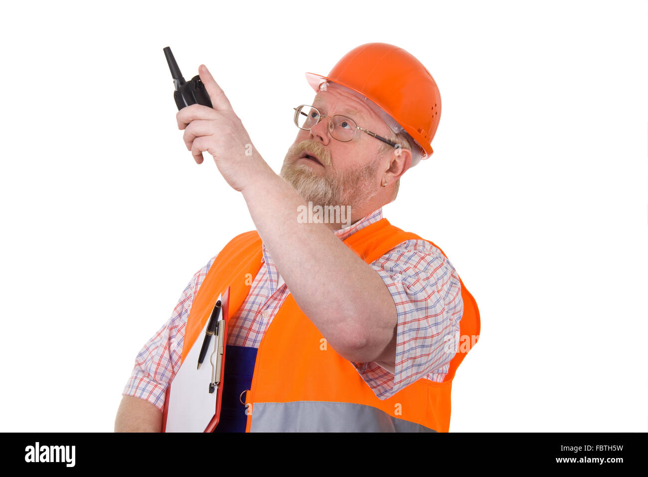 Construction supervisor with walkie talkie Stock Photo