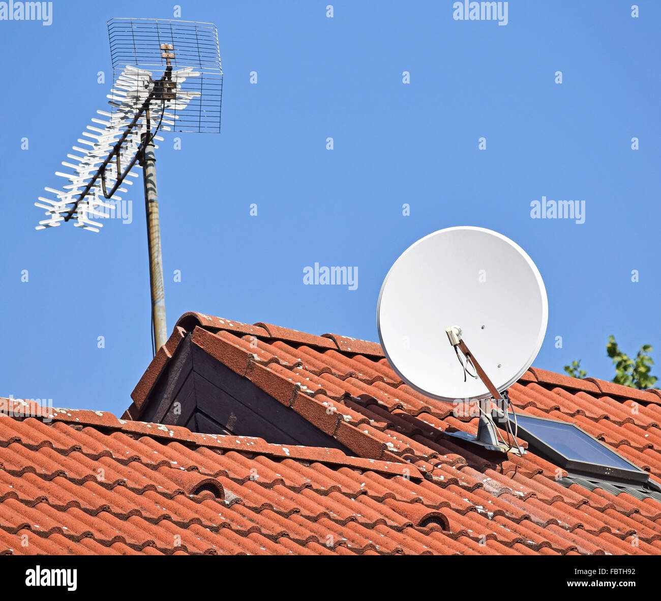 Antennas on the roof of a house Stock Photo Alamy