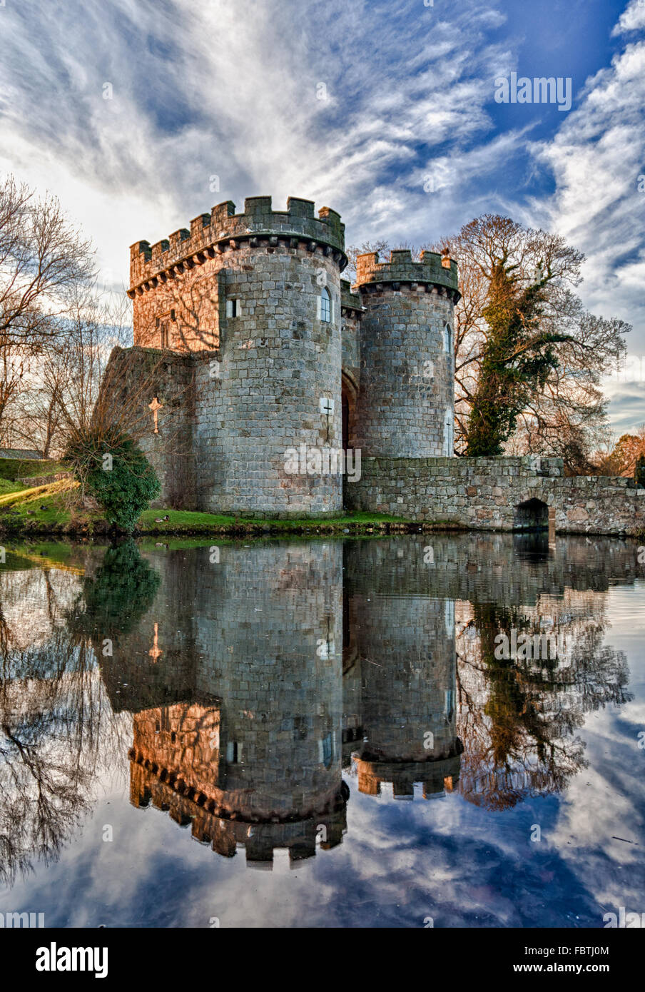 Whittington Castle in Shropshire reflecting on moat Stock Photo