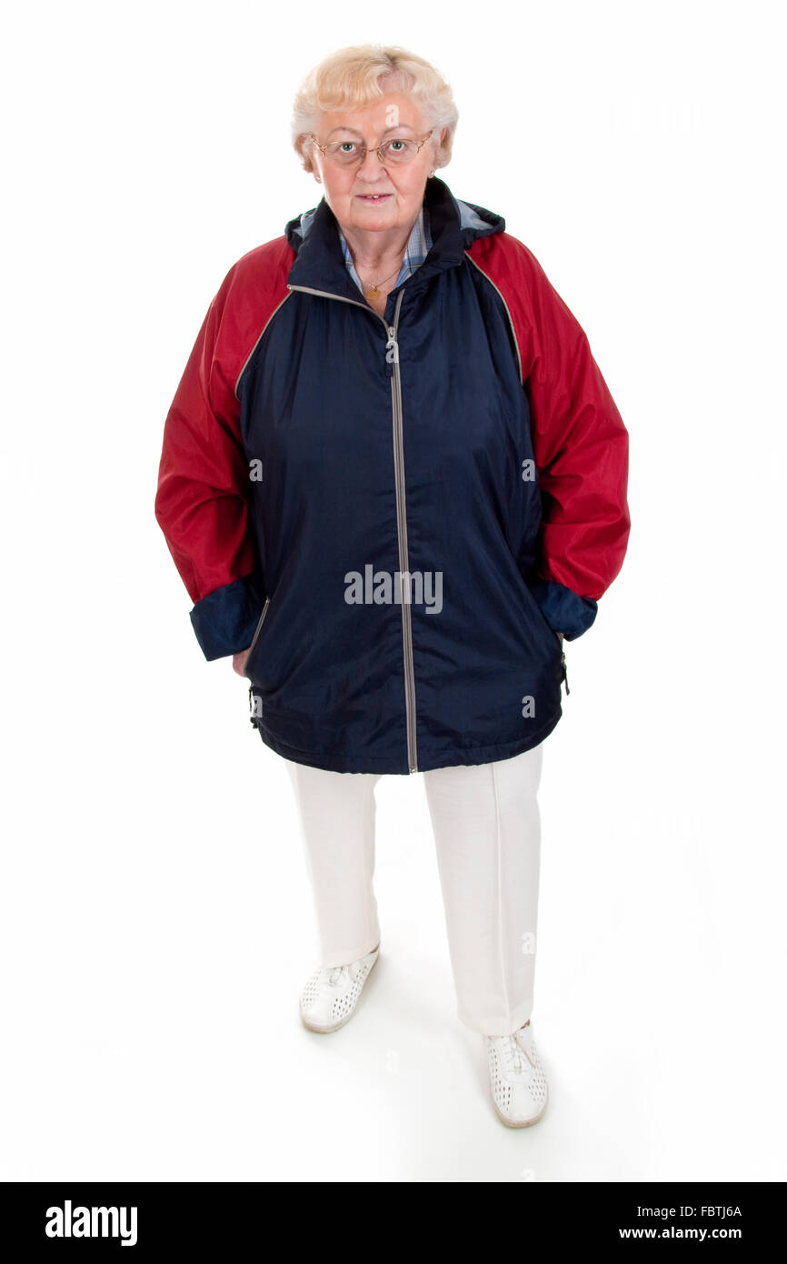 Senior woman in rain jacket Stock Photo