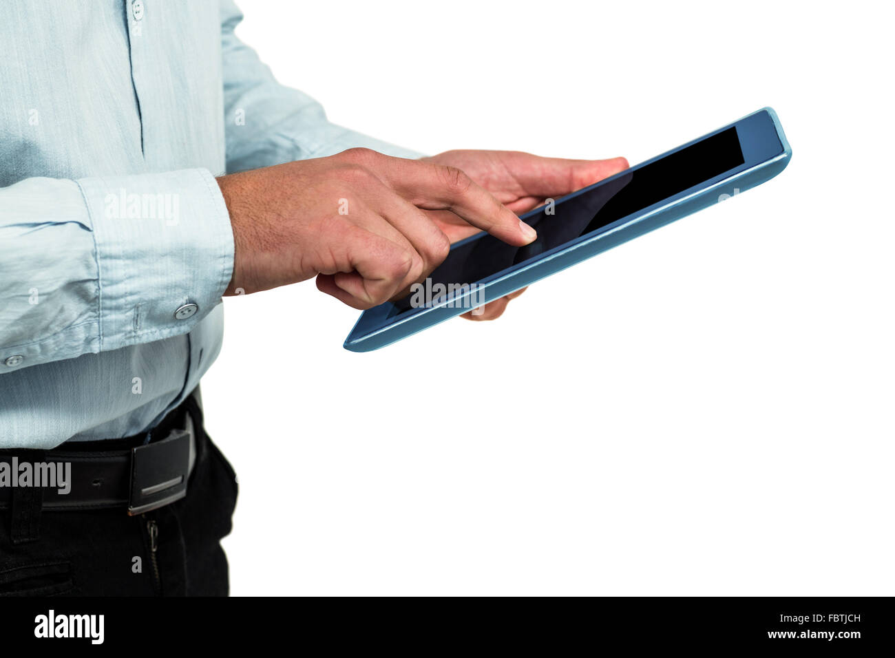 Midsection of man using digital tablet Stock Photo